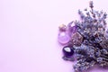 Beautiful amethyst crystals and round rose quartz stone with dry lavender bouquet. Magic amulets. Copy space