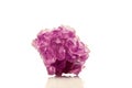 Beautiful amethyst druse close-up on white background -violet va