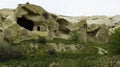 Beautiful Ancient Cave Houses in Remote Area of Cappadocia`s Landscape Royalty Free Stock Photo