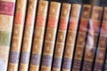 Beautiful ancient old books on shelf in the library Royalty Free Stock Photo