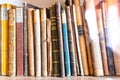 Beautiful ancient old books on shelf in the library Royalty Free Stock Photo