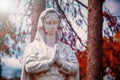 Beautiful ancient statue of Virgin Mary praying Royalty Free Stock Photo