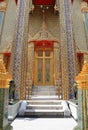 Beautiful Ancient Temple door painting and carving on wood, Thailand Royalty Free Stock Photo