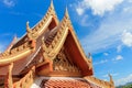 Beautiful ancient temple in Thailand against the blue sky.