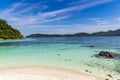 Tropical Turquoise clear blue sea and white sand beach with blue sky background at Lipe Island, Satun, Royalty Free Stock Photo