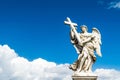 Beautiful angel with Cross in the Bridge of Saint Angelo Castle, Rome Royalty Free Stock Photo