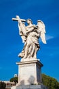 Angel with the Cross statue created by Ercole Ferrata on the 16th century at Sant Angelo Bridge in Rome