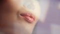 Beautiful Anonymous Woman with Cosmetics Lipstick to Her Sensuous Full Lips. Seductive Female Enjo Royalty Free Stock Photo