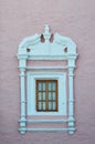 Antique window with frame. white stucco on the pink wall. Royalty Free Stock Photo