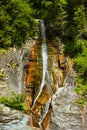 The beautiful Apa Spanzurata waterfall in the Latoritei gorge