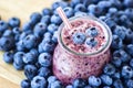 Beautiful appetizer blueberry fruit smoothie milk shake glass jar with juicy fresh berries background top view Yogurt cocktail Nat Royalty Free Stock Photo