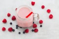 Beautiful appetizer pink raspberries fruit smoothie or milkshake Royalty Free Stock Photo