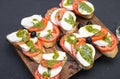 beautiful appetizers bruschetta with cheese and tomatoes