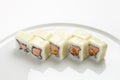 Beautiful appetizing rolls of sushi on a white plate Royalty Free Stock Photo