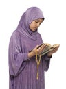 Beautiful Arab Muslim Girl in Islamic Fashion Dress Reading Holy Book of Quran With Happy Smily Face