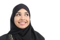 Beautiful arab woman face looking an advertising above