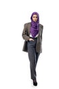 Beautiful arab woman posing in stylish office attire isolated on studio background. Fashion concept