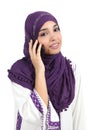 Beautiful arab woman wearing a hijab on the phone