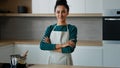 Beautiful arabian cooker chef baker housewife ethnic young vegetarian woman posing in modern kitchen female portrait of