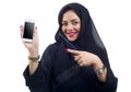 Beautiful Arabian model holding a cell phone on an isolated background