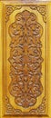 Beautiful Arabic patterns carved from wood on the door. Royalty Free Stock Photo