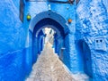 Beautiful arch and blue walls on the street in Chefchaouen, Morocco Royalty Free Stock Photo