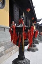 Bronze lanterns with red ribbons from the Jade Buddha Temple courtyard in Shanghai