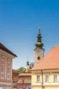 Beautiful architecture of the antique buildings at Zagreg upper town and the tower of the historic St Mary at Dolac church