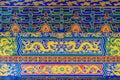 Beautiful architecture and art of wall painting with dragon pattern building in Chinese temple Royalty Free Stock Photo