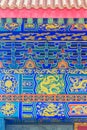 Beautiful architecture and art of wall painting with dragon pattern building in Chinese temple Royalty Free Stock Photo