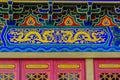 Beautiful architecture and art of wall painting with dragon pattern building in Chinese temple Royalty Free Stock Photo