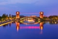 Beautiful architecture building and colorful bridge in twilight Royalty Free Stock Photo