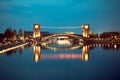 Beautiful architecture building and colorful bridge in twilight Royalty Free Stock Photo