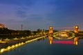 Beautiful architecture building and colorful bridge in twilight Royalty Free Stock Photo