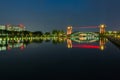 Beautiful architecture building and colorful bridge in twilight Royalty Free Stock Photo