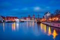 Beautiful architecture of Gdansk old town reflected in the Motlawa river at dawn, Poland Royalty Free Stock Photo