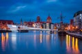 Beautiful architecture of Gdansk old town reflected in the Motlawa river at dawn, Poland Royalty Free Stock Photo