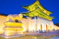Beautiful Architecture in Gyeongbokgung Palace at Seoul city Korea at Twilight time with night light from traffic car Royalty Free Stock Photo