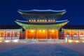 Beautiful Architecture in Gyeongbokgung Palace at Seoul city Korea at Twilight time with night light from traffic car Royalty Free Stock Photo