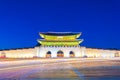 Beautiful Architecture in Gyeongbokgung Palace at Seoul city Korea at Twilight time with night light from traffic car Royalty Free Stock Photo