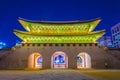 Beautiful Architecture in Gyeongbokgung Palace at Seoul city Korea at Twilight time with night light from traffic car Royalty Free Stock Photo