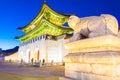 Beautiful Architecture in Gyeongbokgung Palace at Seoul city Korea at Twilight time with night light from traffic car Royalty Free Stock Photo