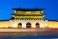 Beautiful Architecture in Gyeongbokgung Palace at Seoul city Korea at Twilight time with night light from traffic car Royalty Free Stock Photo