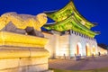 Beautiful Architecture in Gyeongbokgung Palace at Seoul city Korea at Twilight time with night light from traffic car Royalty Free Stock Photo