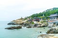 Beautiful Architecture at Haedong Yonggungsa Temple sits upon a Royalty Free Stock Photo