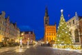 Beautiful architecture of the Long Lane in Gdansk with Christmas ligths at dawn, Poland