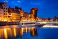 Beautiful architecture of the Main Town of Gdansk by the Motlawa River at night. Poland Royalty Free Stock Photo