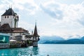 Oberhofen Castle with Thun Lake background in Switzerland