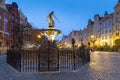 Beautiful architecture of the old town in Gdansk with Neptune fountain at dawn, Poland Royalty Free Stock Photo