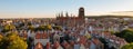 Beautiful architecture of old town in Gdansk, Poland at sunny day. Panorama banner size Aerial view from drone of the Royalty Free Stock Photo